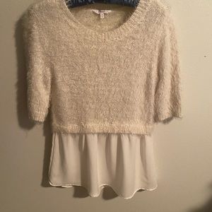 Cream color with tint of pink sweater